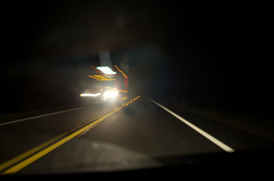 Light trails on road at night