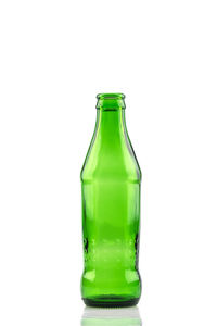 Close-up of glass bottle against white background