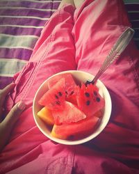 High angle view of strawberries in plate on table