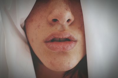 Close-up of young woman's mouth