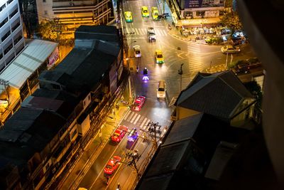 High angle view of traffic on city street at night