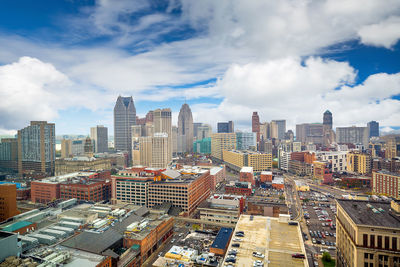 High angle view of buildings in city against sky