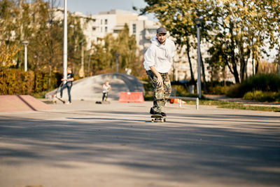 Man on skateboard in park