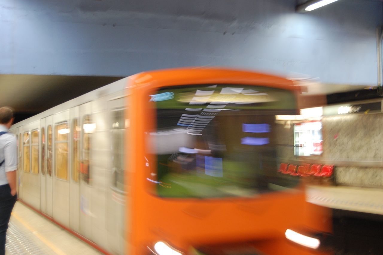 TRAIN IN SUBWAY STATION