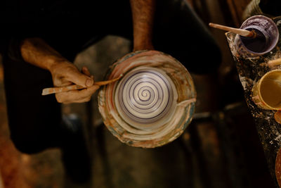 Artisan working with clay