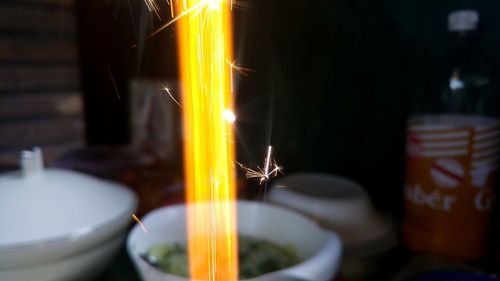 Close-up of illuminated candle