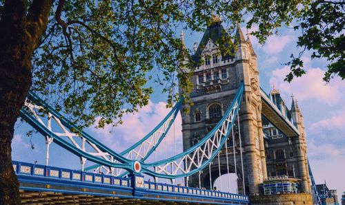 Low angle view of tower bridge against sky