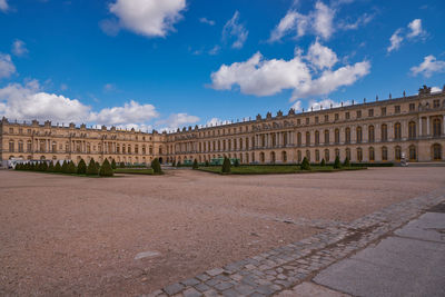 Exterior of historic building against blue sky