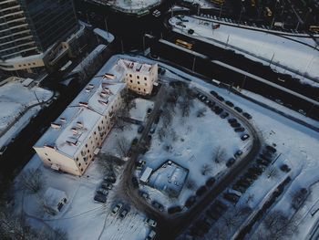 High angle view of cars in city during winter