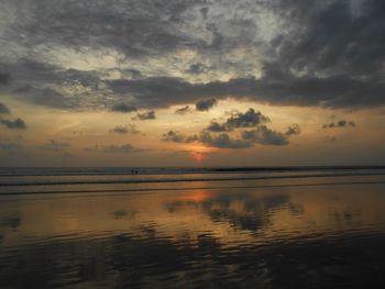 Scenic view of sea against sky at sunset