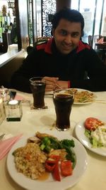 Portrait of man in restaurant