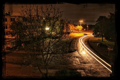 Illuminated street lights at night