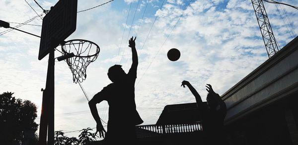 Low angle view of basketball hoop against sky