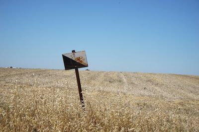 View of landscape against clear blue sky
