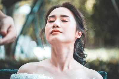 Close-up portrait of a beautiful young woman