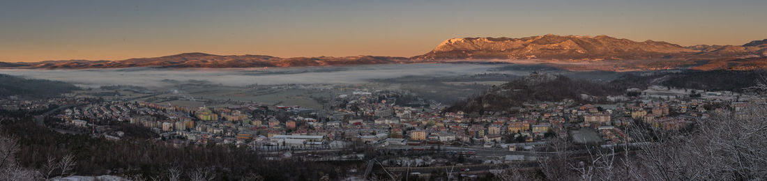 High angle view of townscape against sky during sunset