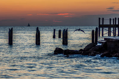 Scenic view of sea against sky during sunset