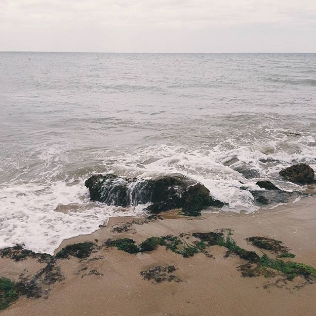 sea, water, horizon over water, scenics, wave, beauty in nature, tranquil scene, tranquility, beach, surf, shore, nature, rock - object, sky, coastline, idyllic, seascape, rock formation, no people, remote