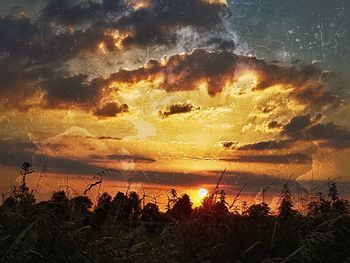 Scenic view of dramatic sky during sunset