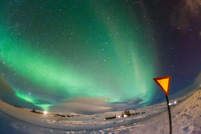 Scenic view of road against sky at night