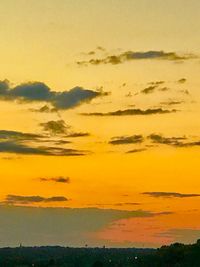 Scenic view of dramatic sky during sunset