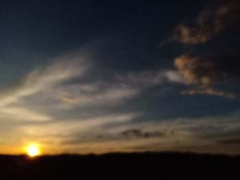 Low angle view of dramatic sky during sunset