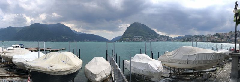 Panoramic view of sea and mountains against sky