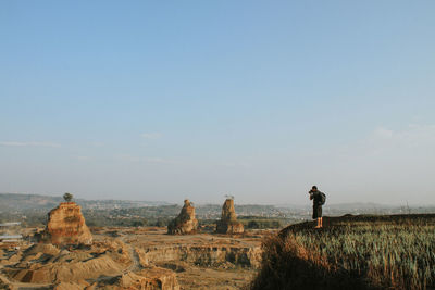 Scenic view of land against sky