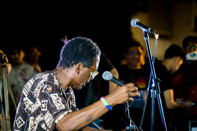 Full length of man standing on stage