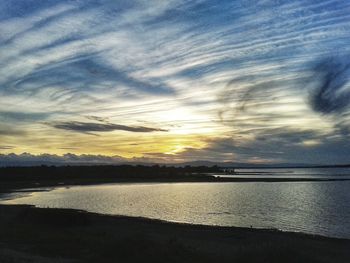 Scenic view of sea at sunset