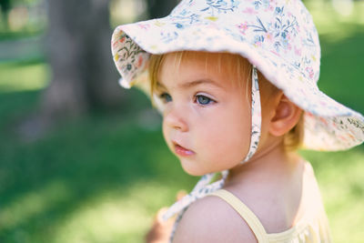 Portrait of cute girl looking away