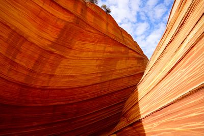 Low angle view of rock formation against sky