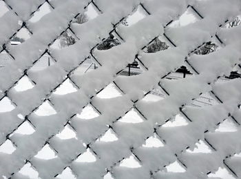 Detail shot of snowed fence