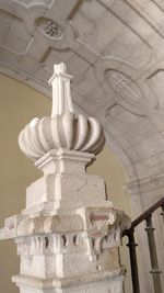 Low angle view of statue against building