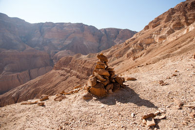 Rock formations in desert against sky