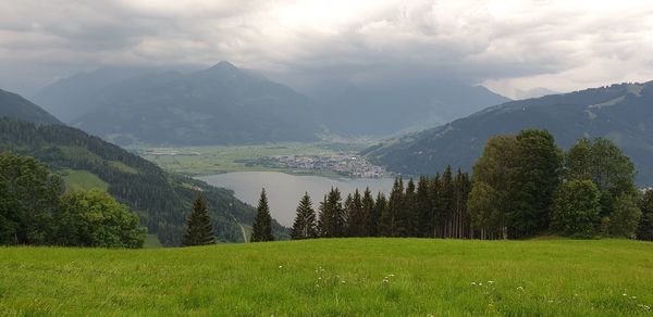 Scenic view of landscape and mountains against sky