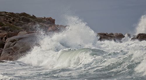 Waves crashing on rocks 