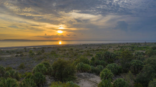 Scenic view of sea against sky during sunset