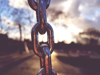 Close-up of chain against sky