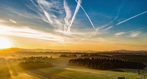 Panoramic view of bavarian landscape against sky during sunrise