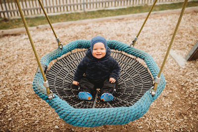 Portrait of happy boy in playground