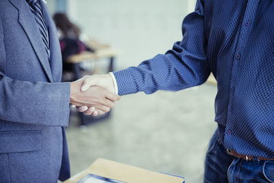 Close-up of woman holding hands