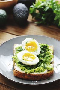 Close-up of breakfast served on table