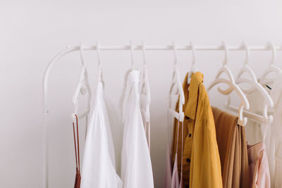 Close-up of clothes hanging on rack