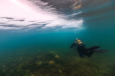 Man swimming in sea