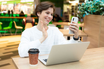Woman doing video call on smart phone