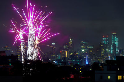 Firework display at night