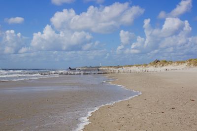 Scenic view of beach against sky