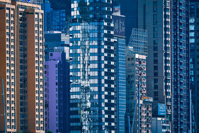 Low angle view of modern buildings in city at night