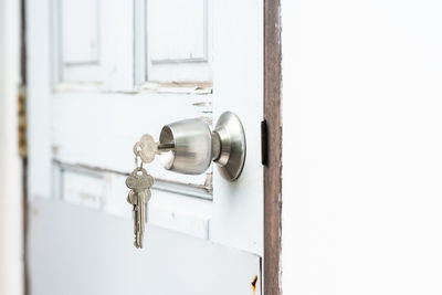 Close-up of white door